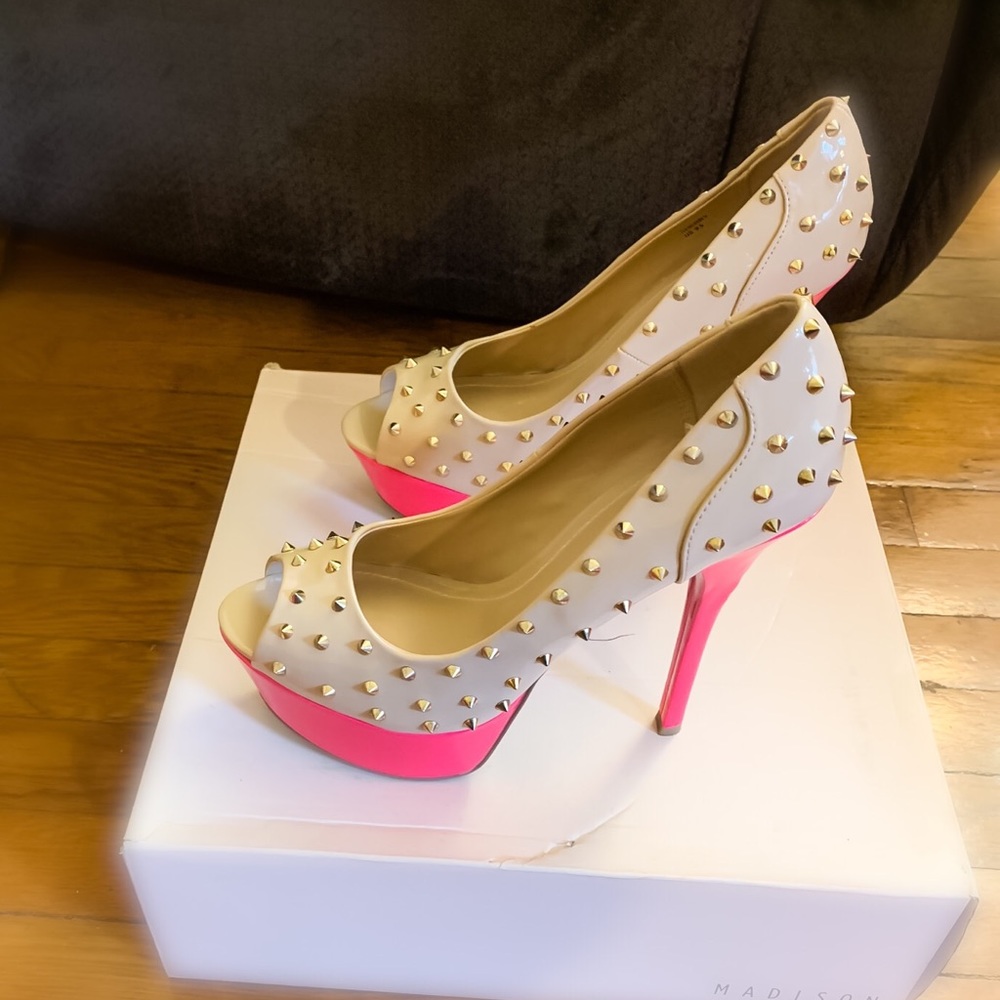 Peep toe nude heels with gold spikes